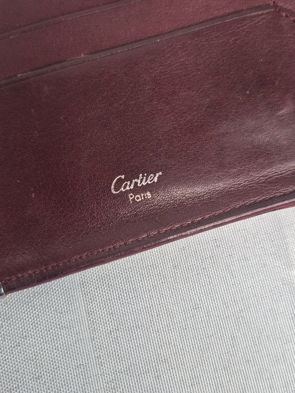 Cartier Men's Leather Bifold Wallet - Burgundy with Metal Corners